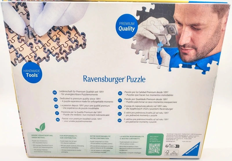 Ravensburger Premium Quality Ravensburger Puzzle box back view, showing product details, text specifications, and a photo of a man assembling a puzzle.
