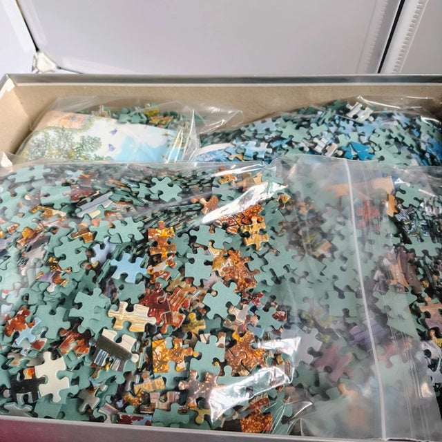 4 x 1000 piece multi-pack jigsaw puzzles. Bagged.