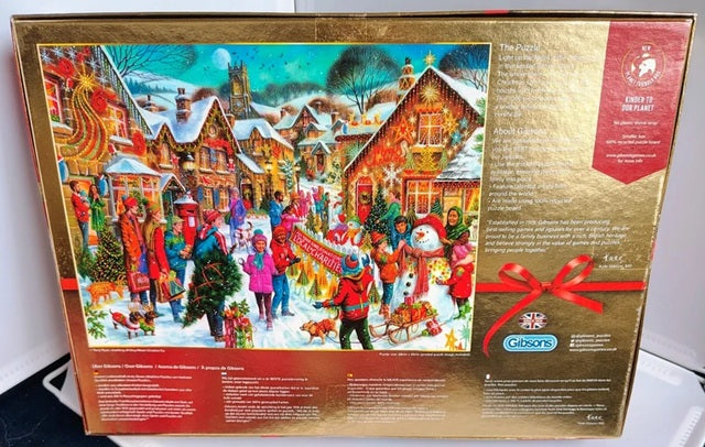Gibsons Christmas puzzle box with a festive village scene on the cover