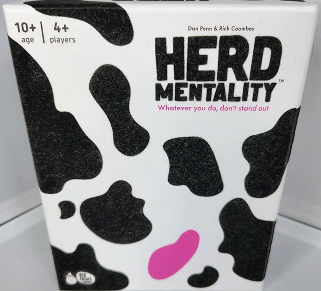 Board game box titled 'Herd Mentality' with cow print design.