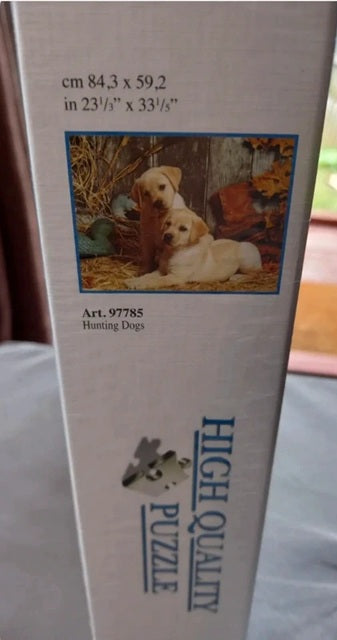 Box of a high-quality puzzle with hunting dogs illustration on the cover