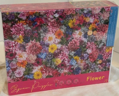 Jigsaw puzzle box with floral design and 'Dover Puzzles' branding.