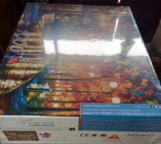 Box of a colorful puzzle with 'InG.a.Dood' branding on a dark background