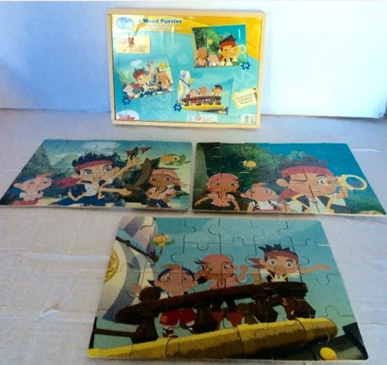 Children's puzzle set with cartoon characters on a light blue background