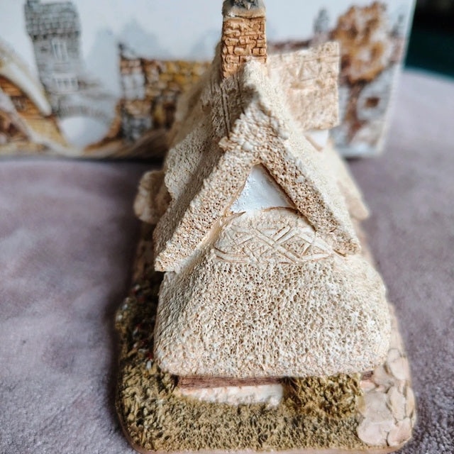 Decorative house made of natural materials on a soft surface