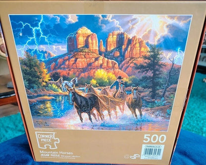 Jigsaw puzzle box with mountain horses design and '500' pieces visible