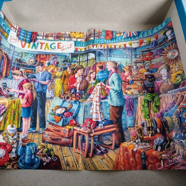 Colorful mural of a vintage market scene with people shopping.