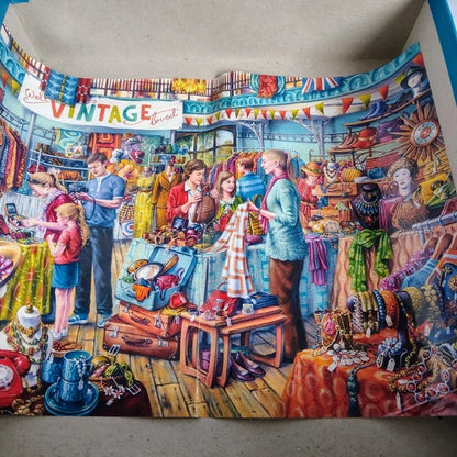 Colorful mural of a vintage market scene with people shopping.