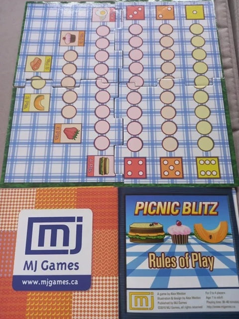 Board game components including a checkered board, dice, and 'Picnic Blitz' rules sheet with MJ Games branding.