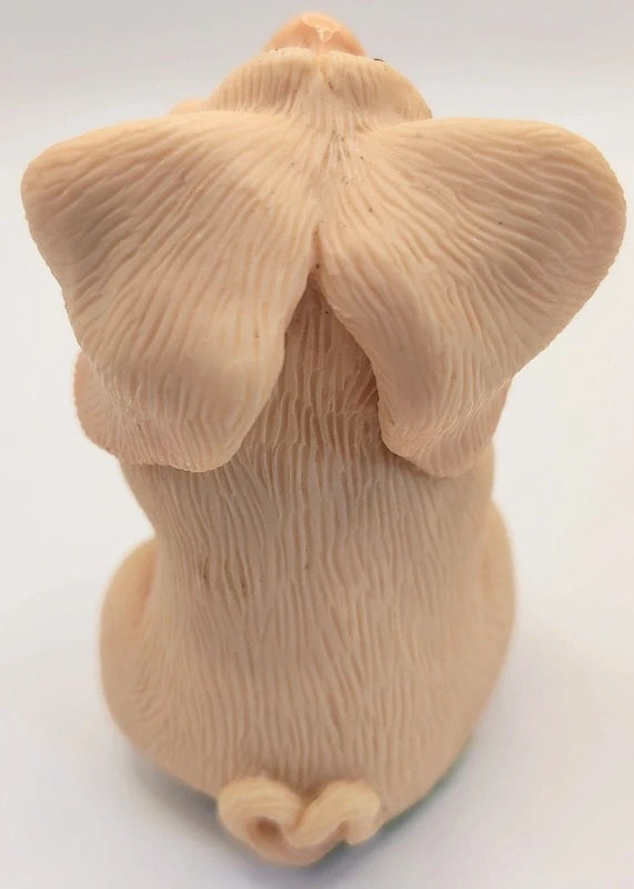 A beige Piggin shown from the back, featuring realistic textured ears, set against a plain white background.