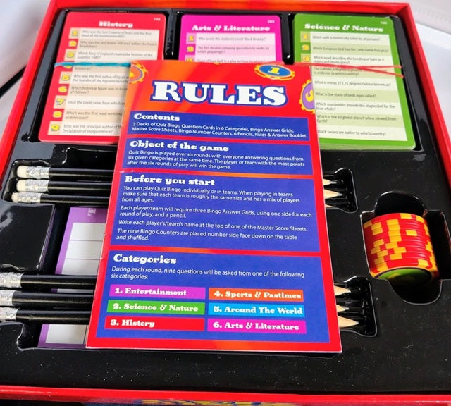 Game set with a 'RULES' card in the foreground