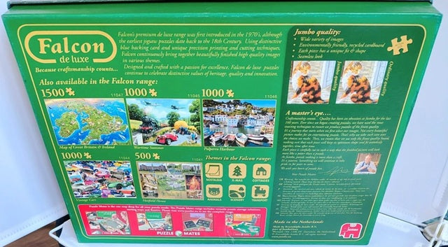 Falcon puzzle box with images of completed puzzles on a green background