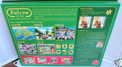Falcon puzzle box with images of completed puzzles on a green background