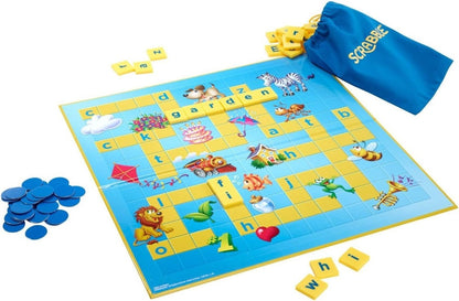 Scrabble board game with tiles and bag on a white background