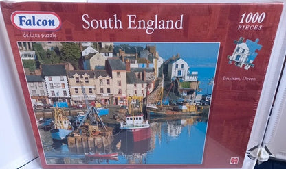 Jigsaw puzzle box featuring a scenic view of South England with 'Falcon' branding.