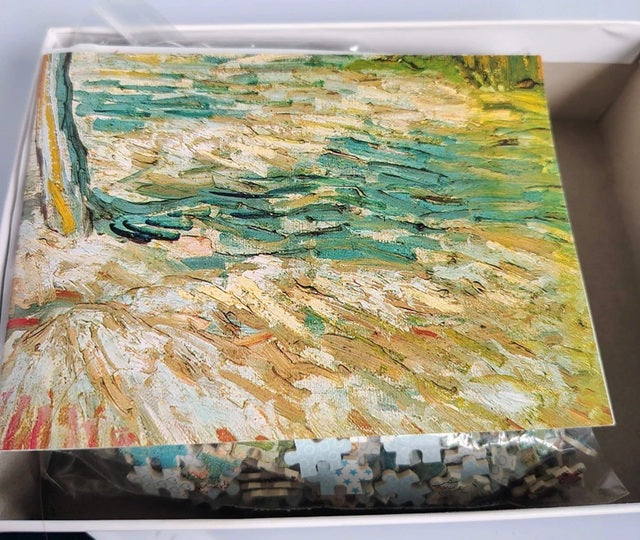 Artistic abstract painting with visible brush strokes on a textured surface