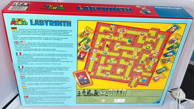 Board game box for 'Super Mario Labyrinth' with colorful design and text.