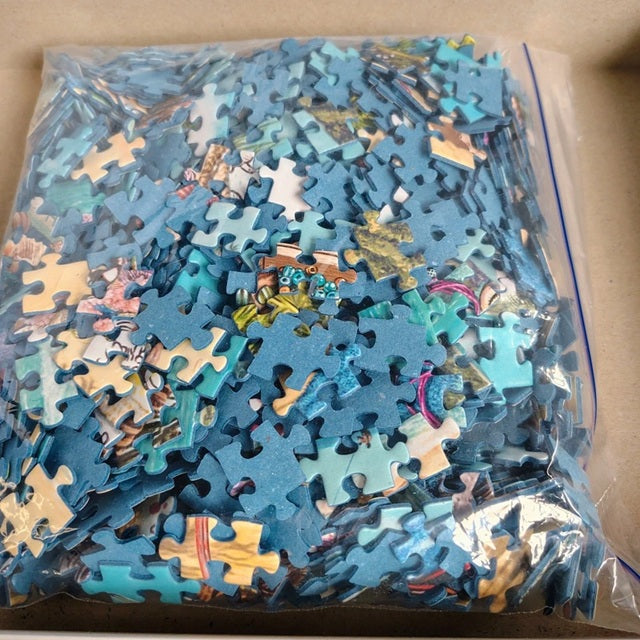 Bag of assorted puzzle pieces with a focus on blue ones.