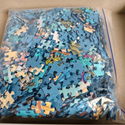 Bag of assorted puzzle pieces with a focus on blue ones.