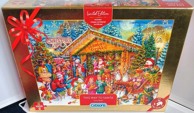 Gibsons Christmas puzzle box with festive scene and Santa's Grotto, featuring a red ribbon and 'Limited Edition' label.