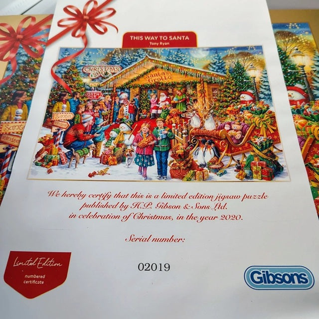 Gibsons Christmas jigsaw puzzle packaging with Santa's Grotto illustration and limited edition details.