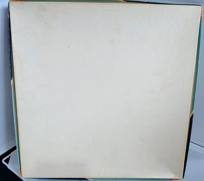 Back cover of a book with a plain white page