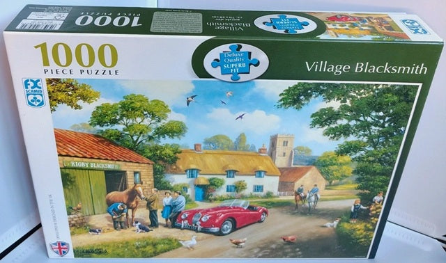 Jigsaw puzzle box titled 'Village Blacksmith' with a scenic village illustration on the cover.