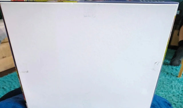 White sheet of paper on a textured surface