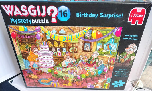 A Jumbo Wasgij 16 'Birthday Surprise!' jigsaw puzzle box, showing a colorful illustrated birthday party scene on the front with a large number 16 and the Jumbo elephant logo.