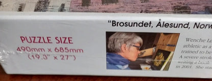 Puzzle box with text and a small image of a person on a wooden surface.