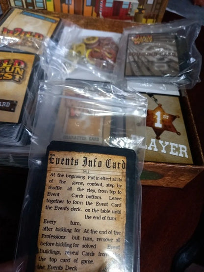 Collection of trading cards in packaging with a 'Events Info Card' in the foreground.