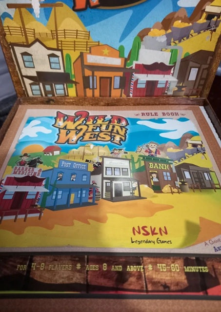 Board game box for 'Wild West' by NSKN Games with a colorful western-themed cover.