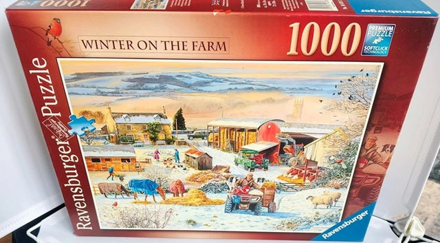 Ravensburger puzzle box titled 'Winter on the Farm' with a snowy farm scene illustration.