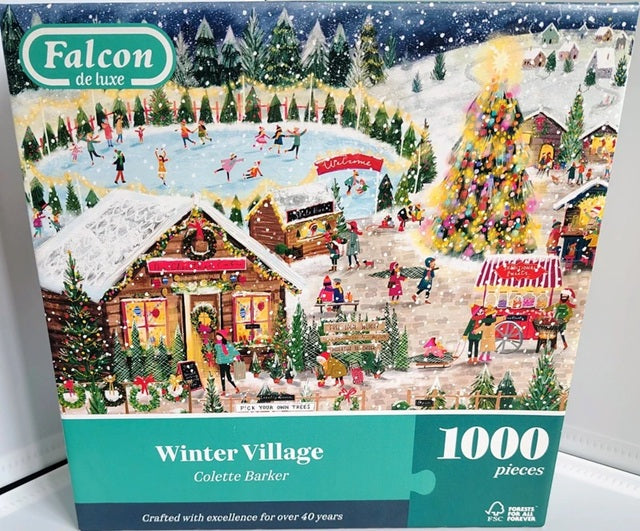 Falcon Deluxe Winter Village puzzle packaging with a snowy village scene on the cover.