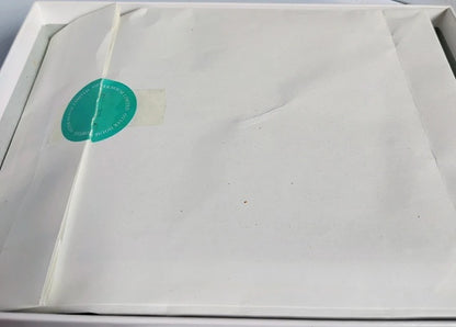 envelope containing jigsaw puzzle pieces.